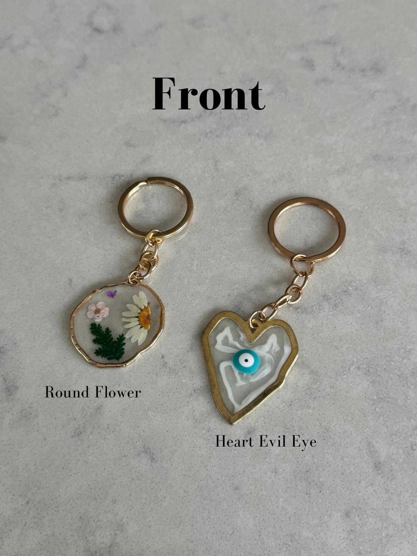 Pressed flower Resin Keyring and Resin Evil eye marble look Keyrings